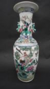 A Late Qing period Cantonese Famille Rose vase with dragon form handles and decorated with birds and