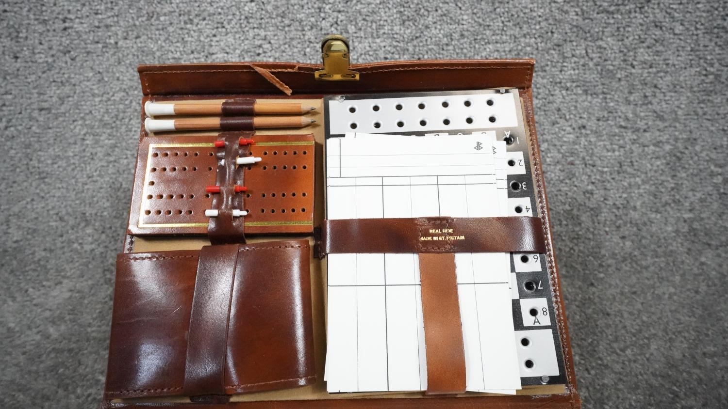 A leather cased lockable travelling gaming set, including dice, gaming pieces, cribbage, chess board - Image 3 of 6