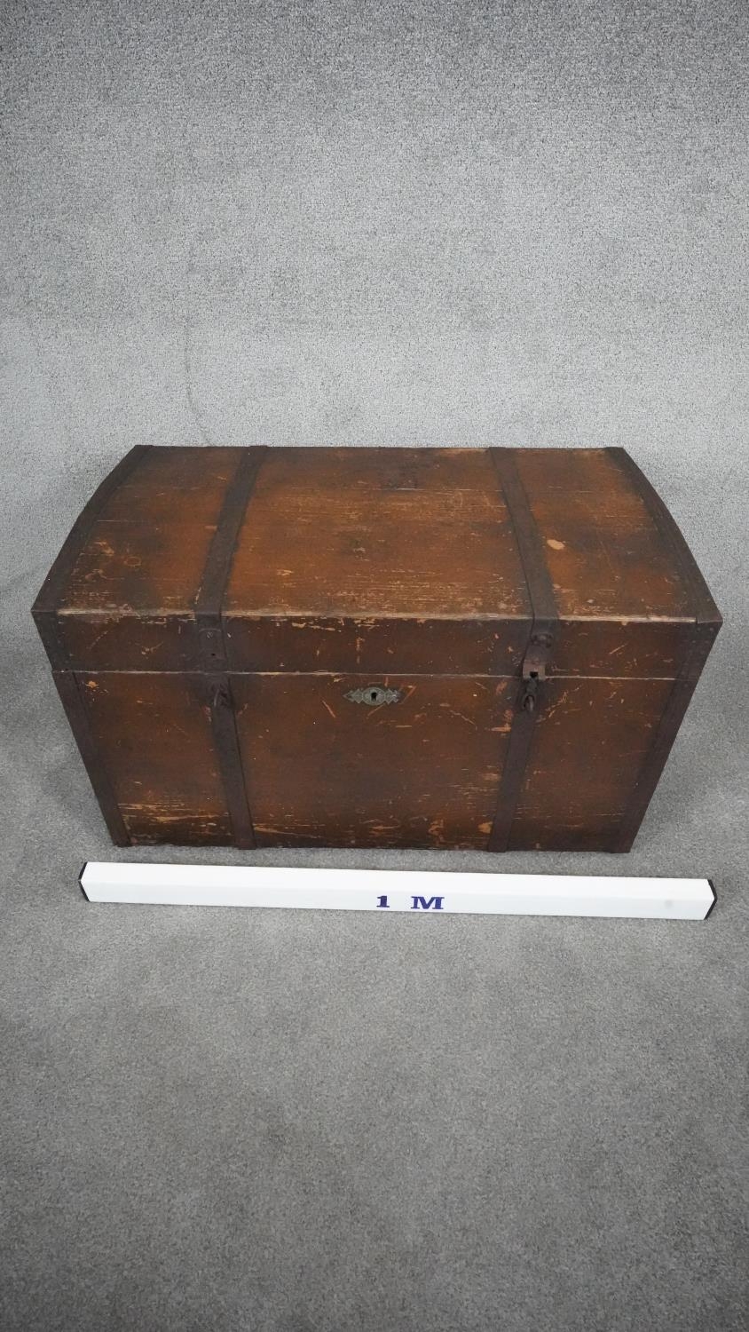A 19th century distressed painted iron bound pine coffer with twin carrying handles, H.54 W.89 D.52. - Image 9 of 9