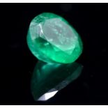 A loose oval shape mixed cut emerald with an approximate carat weight of 2.71 carats.