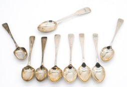 A collection of nine silver tea spoons. Inlcuding three tea spoons with engraved monogram,