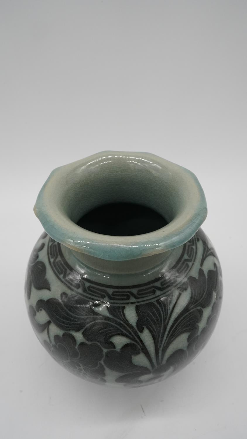 A 20th century Korean celadon glaze ceramic baluster vase with ruffled rim. Decorated with a - Image 2 of 4