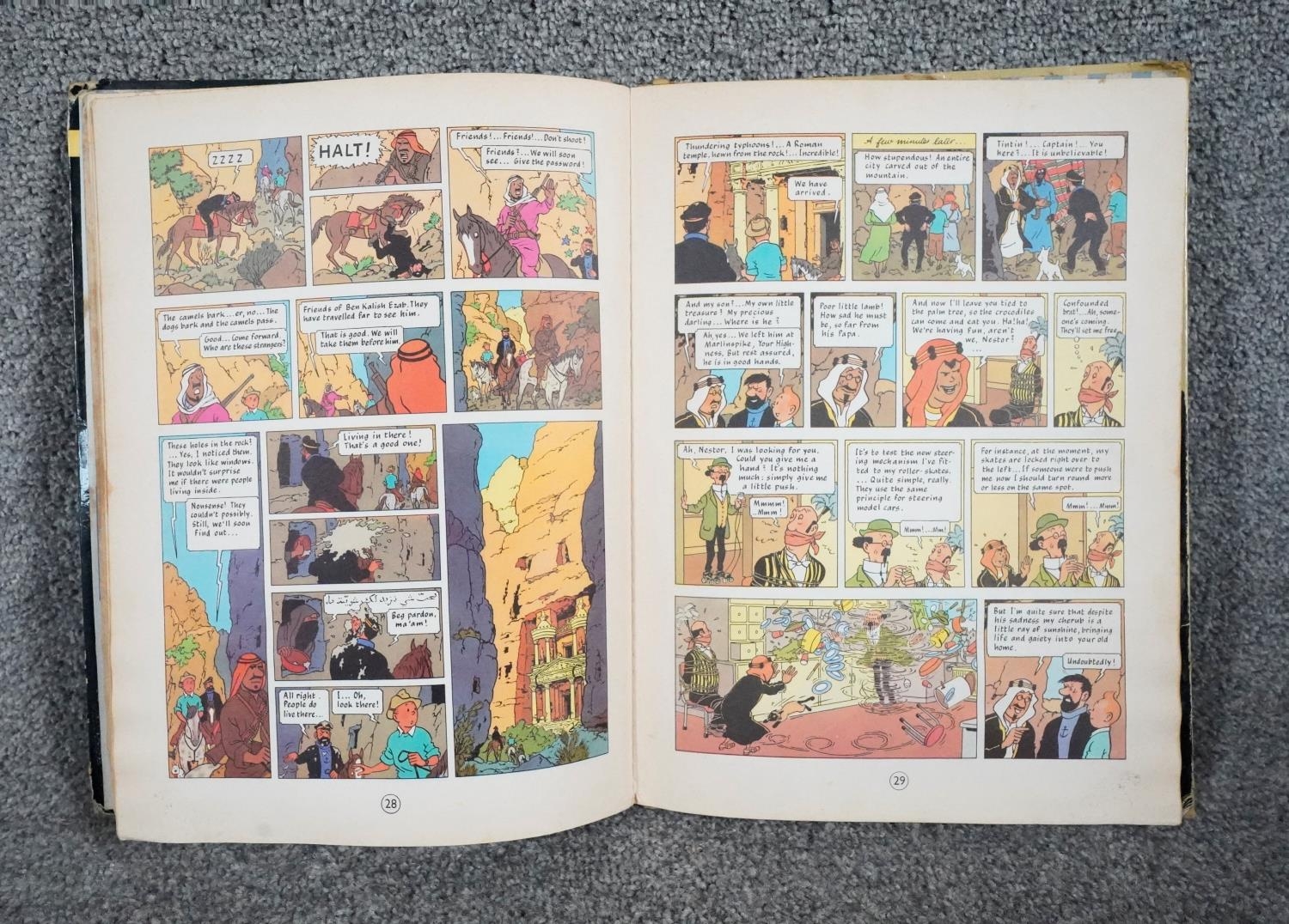 A collection of twelve vintage Tintin comics. H.31 W.23 - Image 24 of 24