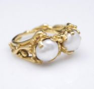 A Charles de Temple 1980's 18 carat gold and cultured pearl organic form ring. Each pearl with a