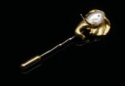 A 1980's Charles de Temple 18 carat gold and baroque pearl elephant head stick pin. Hallmarked