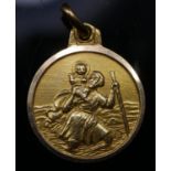 A yellow metal (tested higher than 9 carat) St Christopher with matte finish. Unmarked. L.2cm