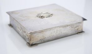 Charles Boyton, an Art Deco silver box, London 1936, planished cuboid form, on plain bracket feet,