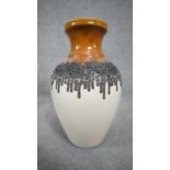 A large vintage West German Bay Keramik fat lava glaze vase with black drip design and honey glaze