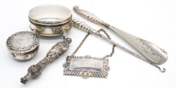 A collection of silver. Including a silver perfume bottle lid, a silver oval trinket box, boot