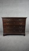 A Georgian style mahogany chest of drawers with brass swan neck handles on bracket feet. H.80 W.98