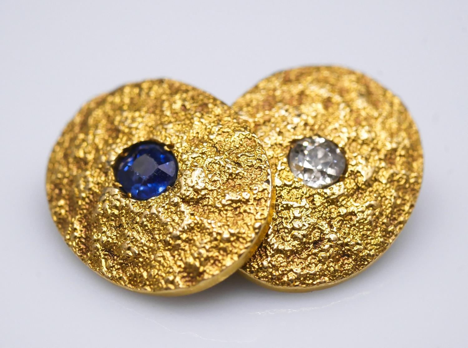 A pair of 18 carat yellow gold gemset textured cufflinks. One set with a cushion shape mixed cut - Image 3 of 8