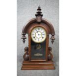 A late 19th century mahogany cased American mantel clock with eight day movement. No Key. H.60 W.