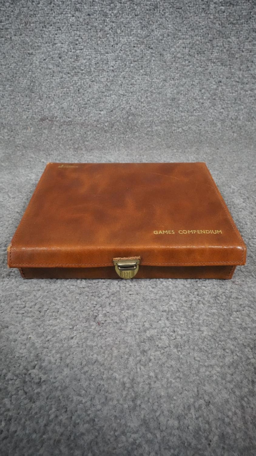 A leather cased lockable travelling gaming set, including dice, gaming pieces, cribbage, chess board - Image 2 of 6