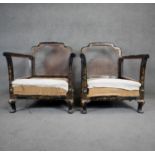 A pair of black lacquered bergere armchairs with gilt hand detailed Chinoiserie decoration. H.83cm