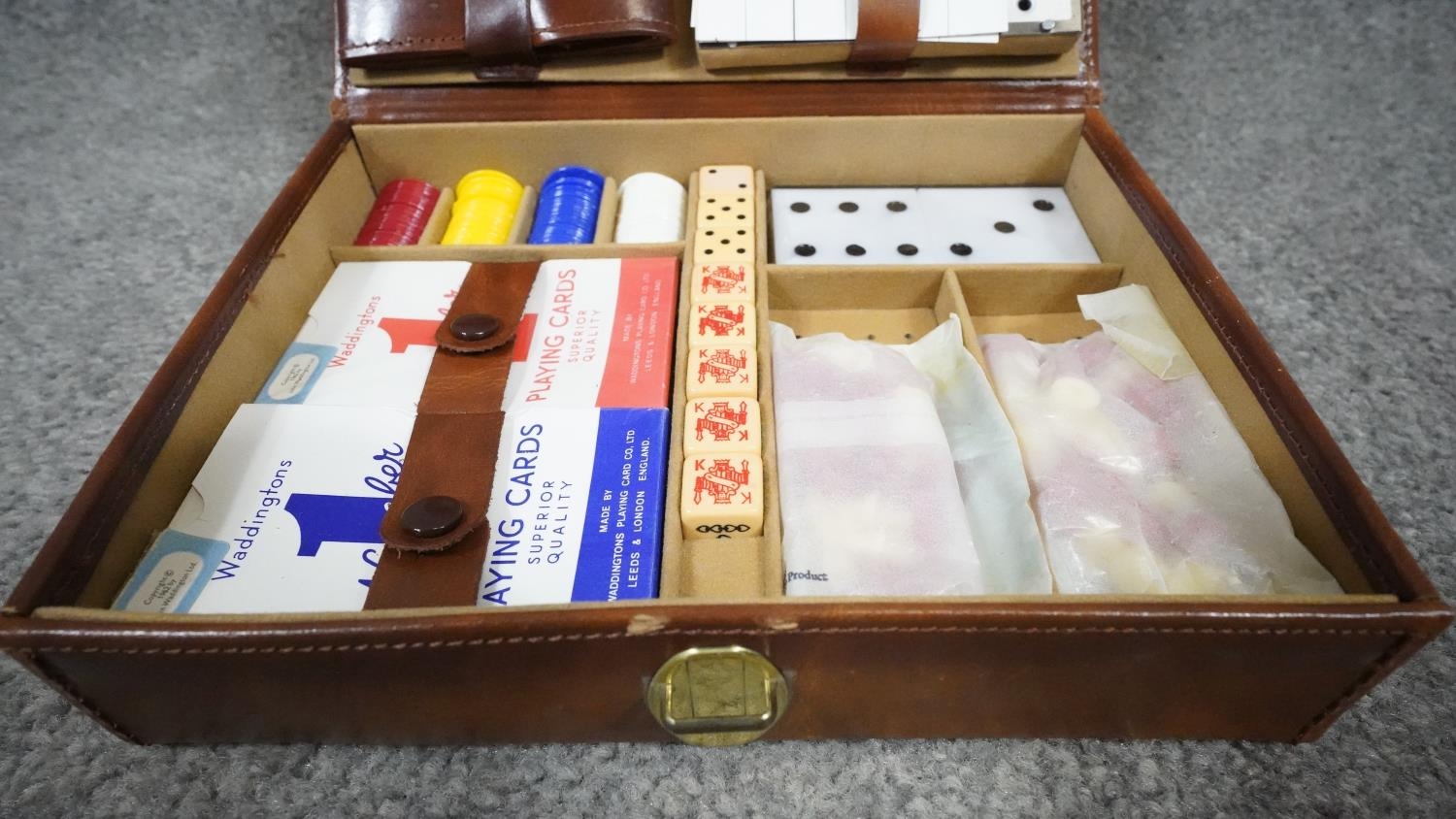 A leather cased lockable travelling gaming set, including dice, gaming pieces, cribbage, chess board - Image 4 of 6