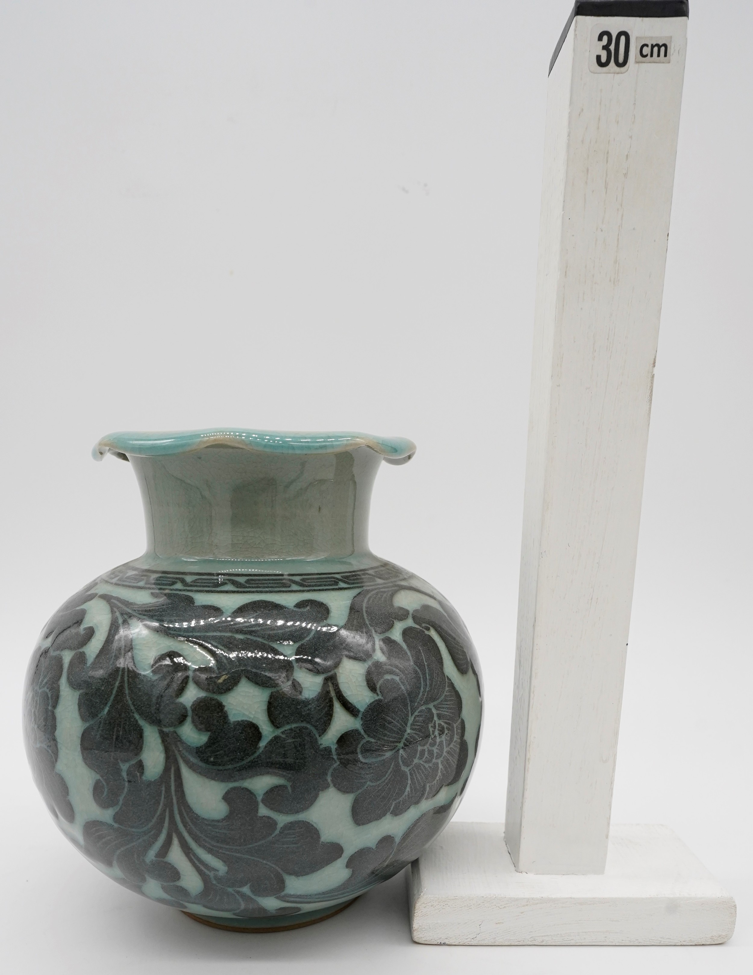 A 20th century Korean celadon glaze ceramic baluster vase with ruffled rim. Decorated with a - Image 4 of 4