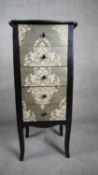 An ebonised and floral decorated French style pedestal chest on cabriole supports. H.105 W.45 D.35