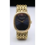 A vintage Patek Philippe Ellipse ladies 18 carat watch. With oval shaped face with blue dial and