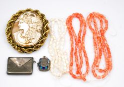 A collection of costume and antique jewellery. Including a sterling silver envelope form stamp