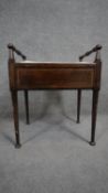 An Edwardian stained beech piano stool with sheet music compartment. H.60 W.50 D.35cm