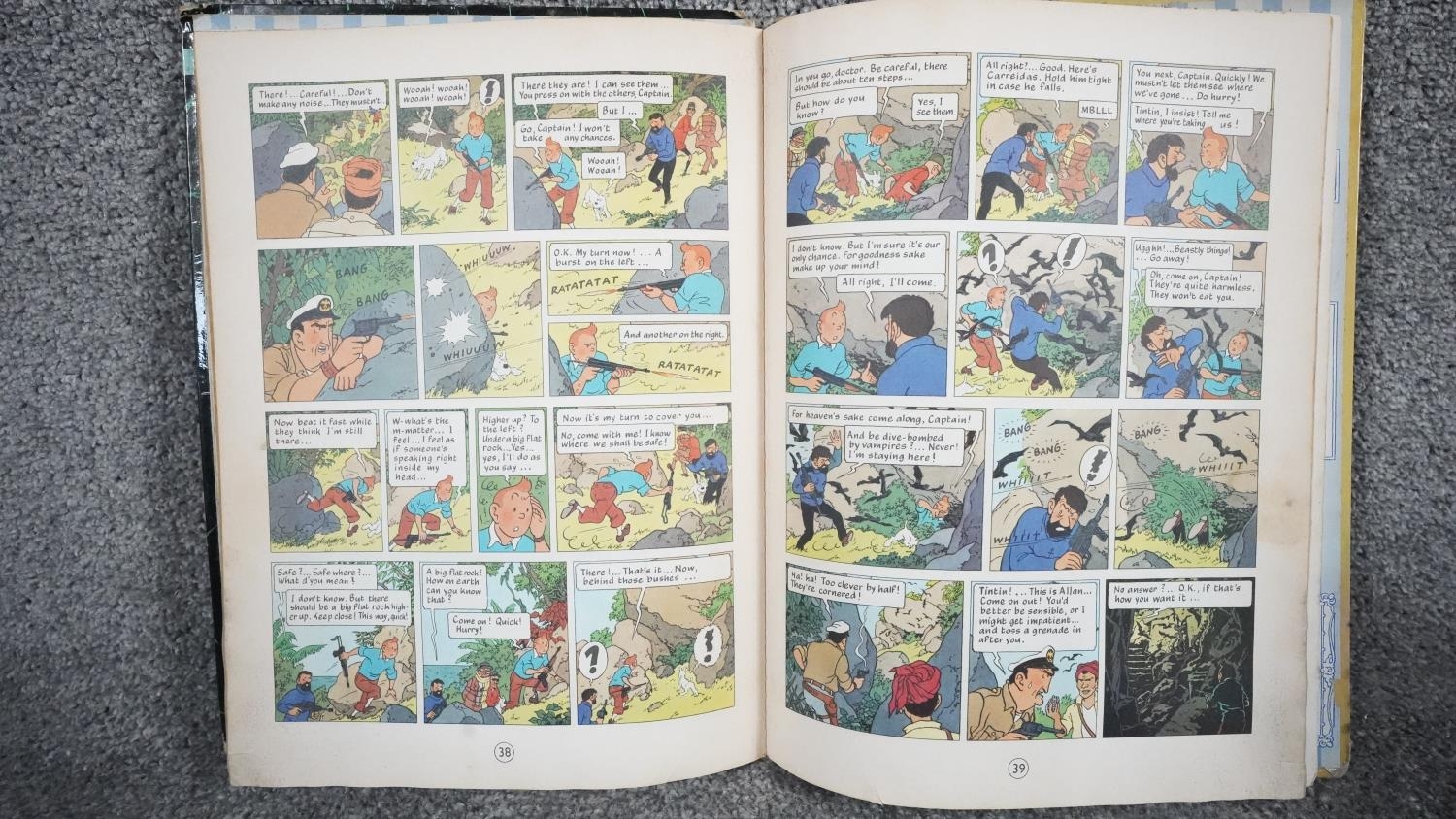 A collection of twelve vintage Tintin comics. H.31 W.23 - Image 4 of 24