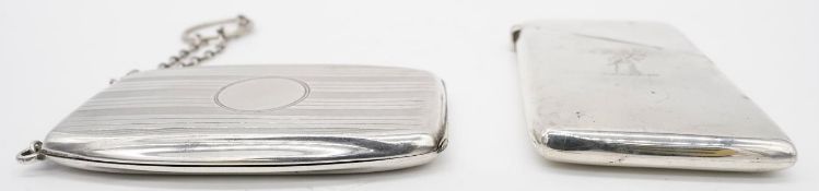 Two silver visitors card cases. One with diagonal hinged lid with engraved crest of arms.