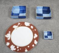 A Shiseido design Angela Cummings dinner plate along with three glazed ceramic dishes with quartered