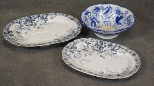 Three Victorian blue and white transfer design bowls and meat platters. Each with a stylised