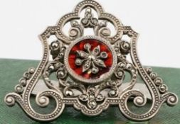 An antique white metal, marcasite and red guilloche enamel shagreen note/letter clip. The hinged