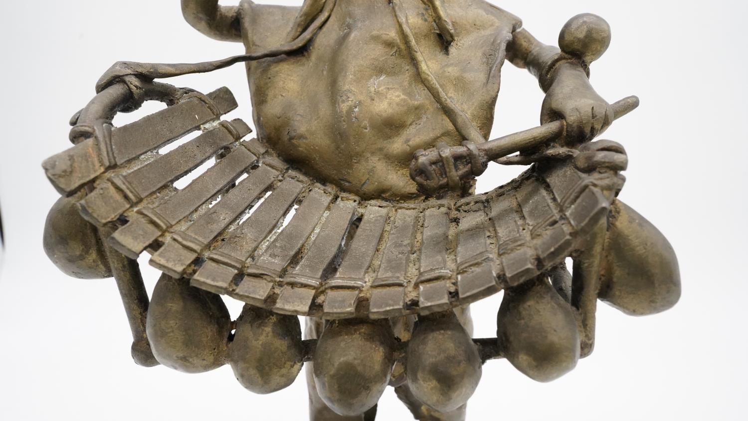 A bronze sculpture of a Tribal Balafon player. H.37 W.20 - Image 3 of 7
