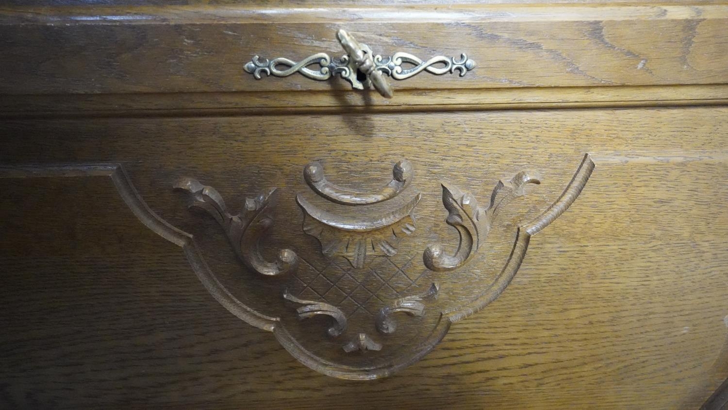 A Continental light oak drinks cabinet with carved fall above two drawers on cabriole supports. H. - Image 6 of 8