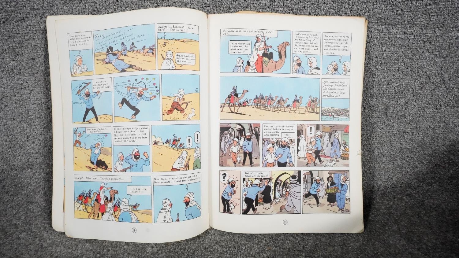 A collection of twelve vintage Tintin comics. H.31 W.23 - Image 16 of 24