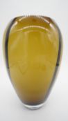An amber and black blown Art Glass vase of ovoid shape. H.29 W.20 D.20