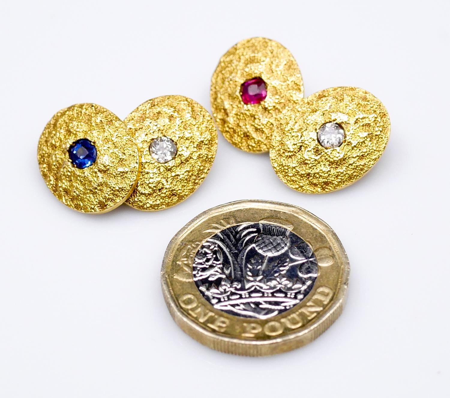 A pair of 18 carat yellow gold gemset textured cufflinks. One set with a cushion shape mixed cut - Image 8 of 8