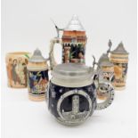 A collection German salt glaze steins in various sizes along with a Crown Ducal Harmony Guinness