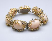 Attributed to Charles de Temple. A yellow and white metal (tested 18 carat) organic form pink