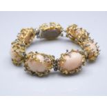 Attributed to Charles de Temple. A yellow and white metal (tested 18 carat) organic form pink