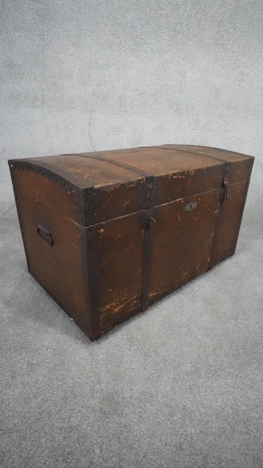 A 19th century distressed painted iron bound pine coffer with twin carrying handles, H.54 W.89 D.52. - Image 5 of 9
