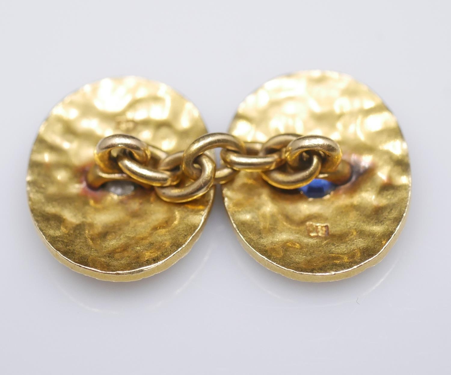 A pair of 18 carat yellow gold gemset textured cufflinks. One set with a cushion shape mixed cut - Image 4 of 8