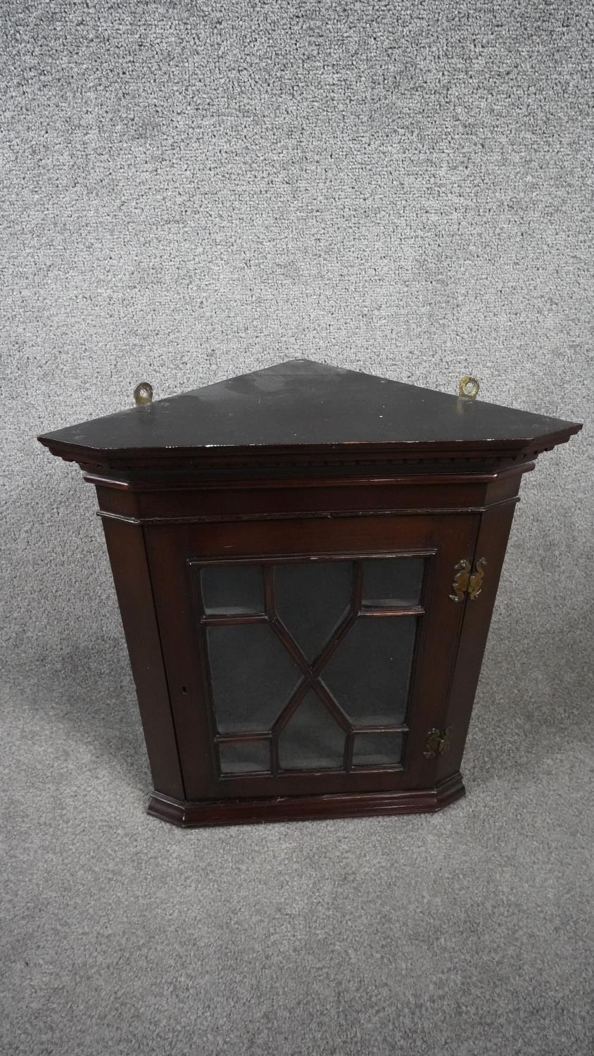 A 19th century mahogany hanging corner cabinet with astragal glazed door. H.52 W.44 D.25 (locked and - Image 2 of 7