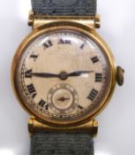 A vintage 18 carat Gracher & Syde, Reading watch on woven strap. The dial with black Roman