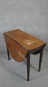 A 19th century mahogany drop flap table with gate leg action. H.71 L.123 W.88cm