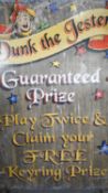 A vintage wooden painted fairground sign. Dunk the Jester. H.128 W.91cm