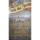 A vintage wooden painted fairground sign. Dunk the Jester. H.128 W.91cm