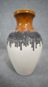 A large vintage West German Bay Keramik fat lava glaze vase with black drip design and honey glaze