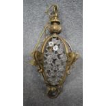 A brass framed ceiling chandelier with crystal drops. H.83 W.29cm