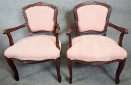 A pair of Continental style open armchairs in damask upholstery on cabriole supports. H.84