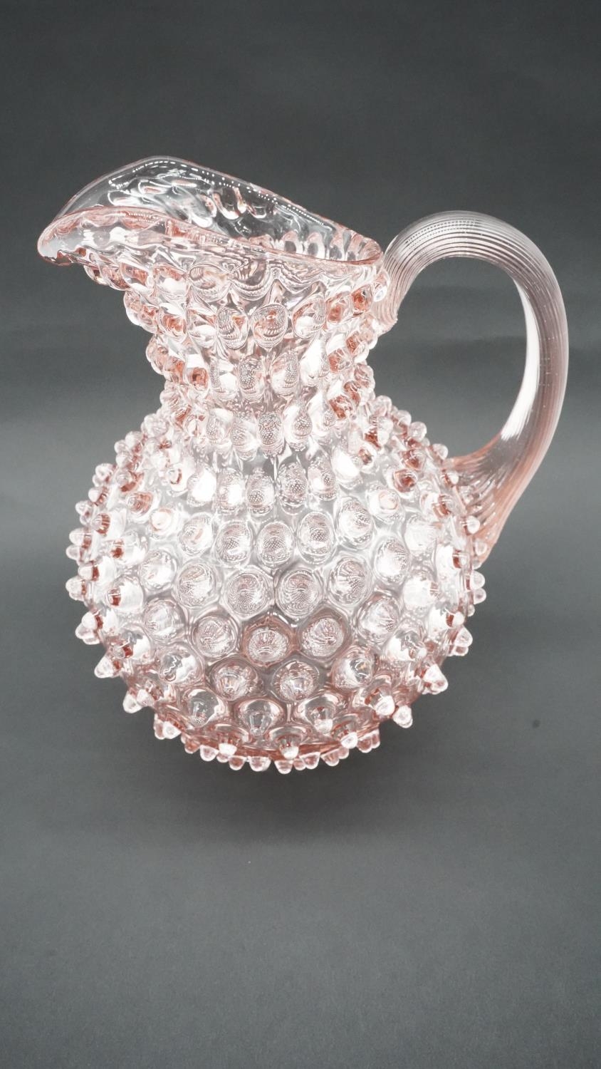 A contemporary Klimchi Rosaline hobnail Art Glass jug. Maker's stamp to the base. H.24cm - Image 2 of 5