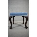 A mahogany mid Georgian style footstool on carved cabriole supports. H.50 W.53 D.43cm