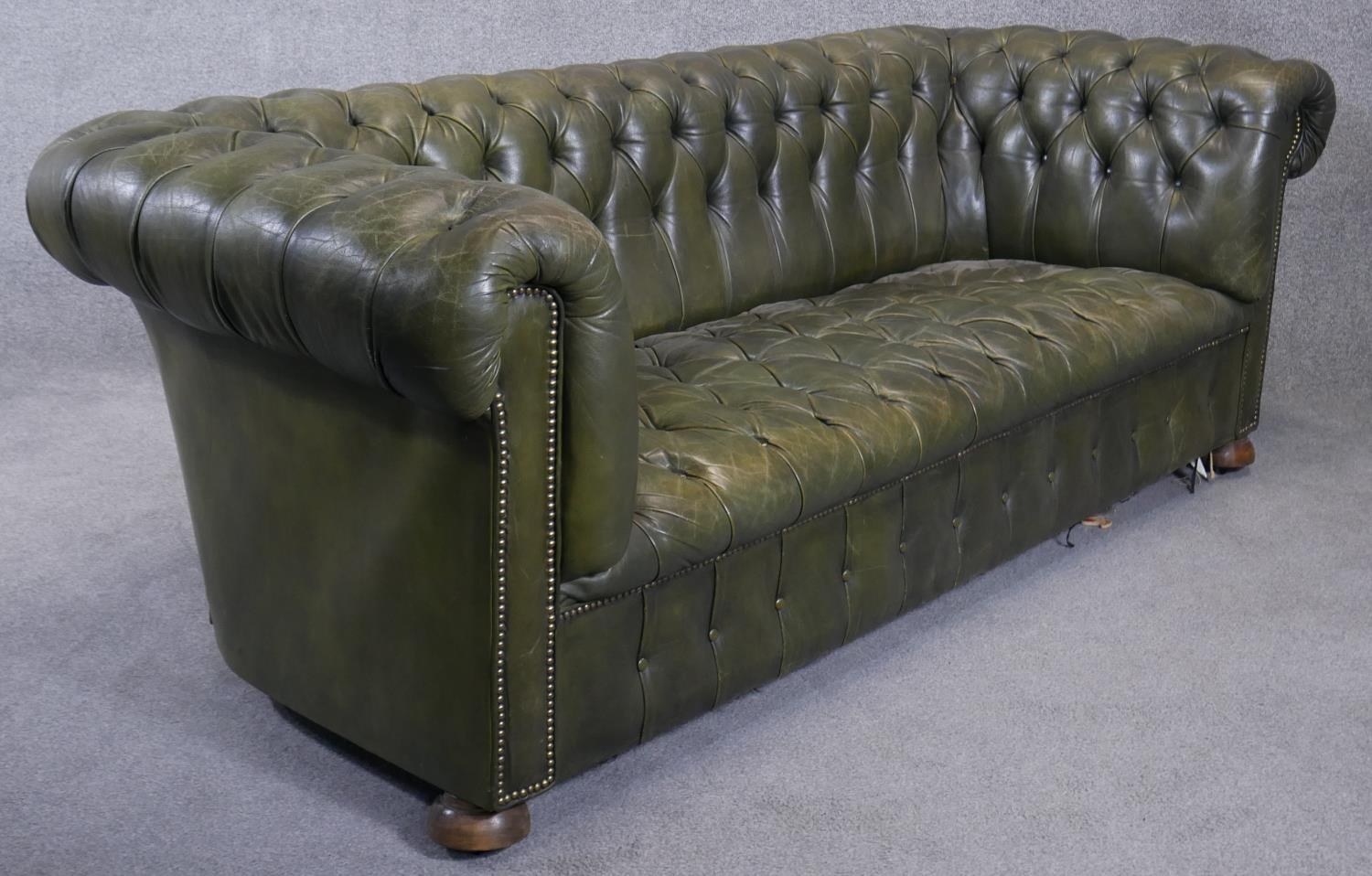 A Chesterfield sofa in leather buttoned upholstery to the seat and back. H.75 W.200 D.90cm - Image 2 of 5